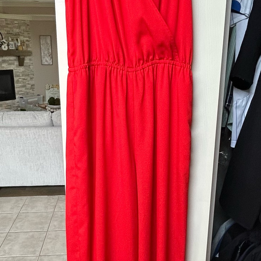 Bebe Red Sleeveless Jumpsuit with Flattering Waist